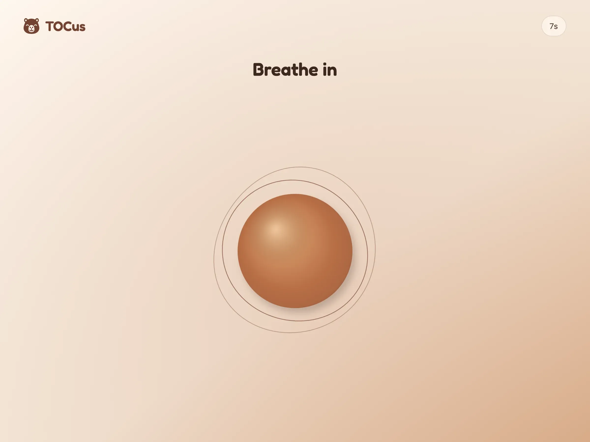 The TOCus pause screen, with the words Breathe in above a clay sphere, a 7-second countdown in the corner, and a light brown background.